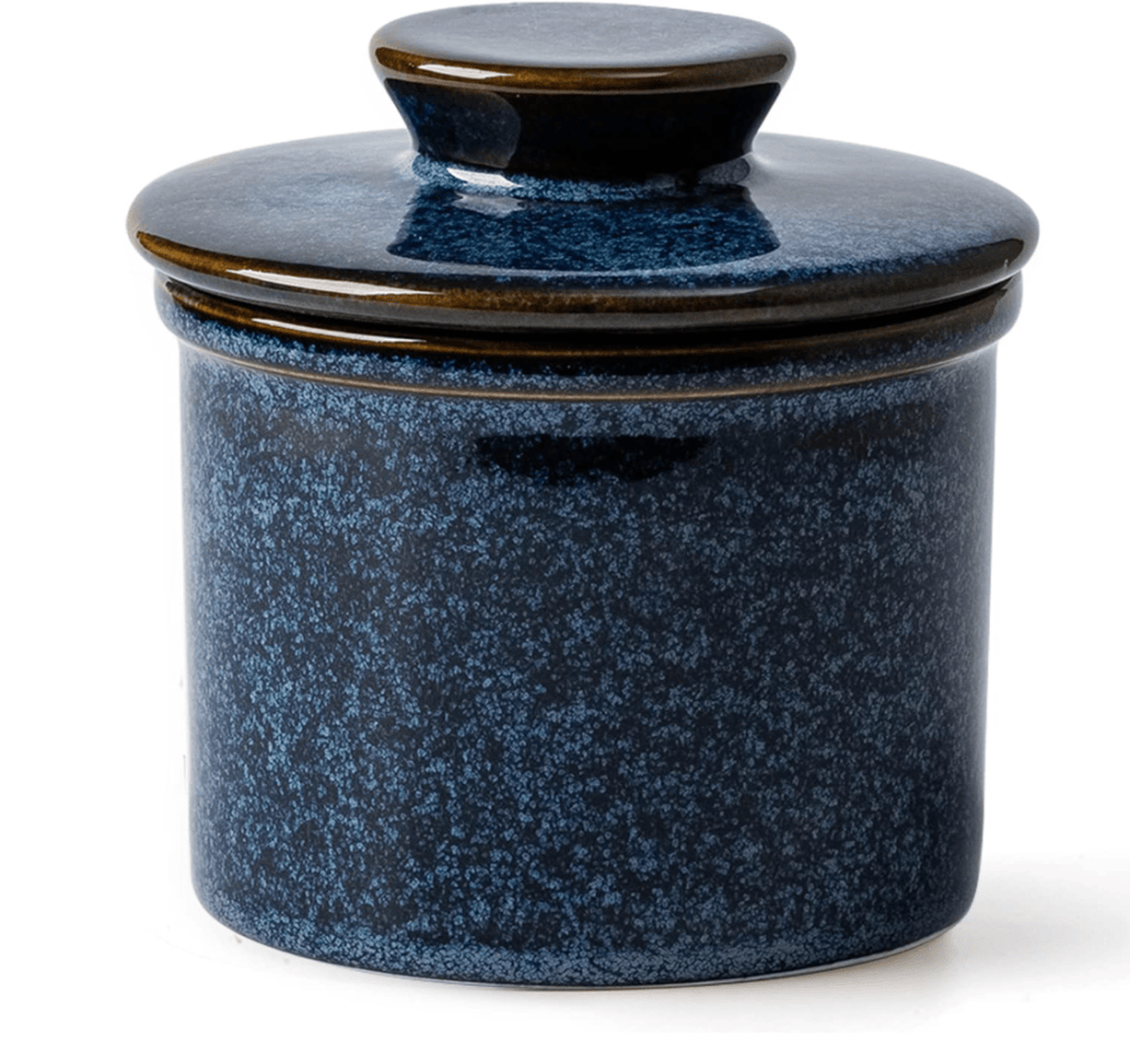 A dark blue ceramic storage jar with a glossy finish and a matching lid.