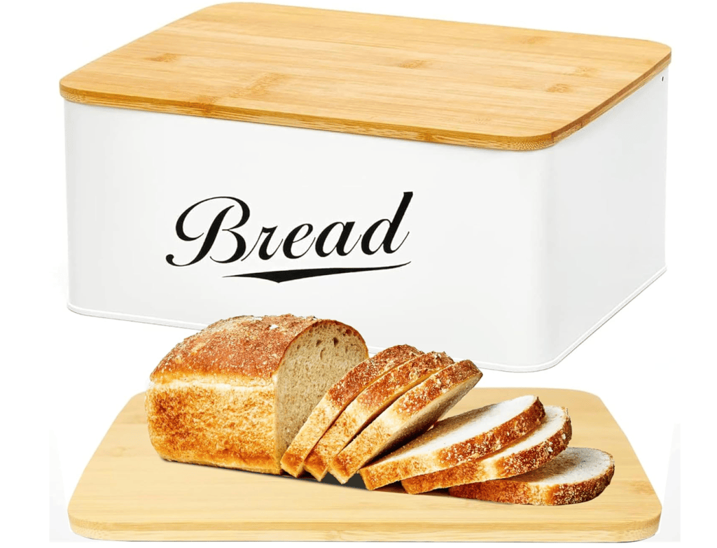 A white bread box with a bamboo lid labeled 'Bread', showcasing a sliced loaf of bread on a wooden cutting board.