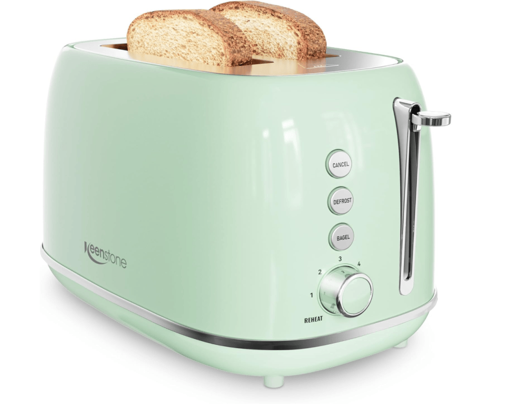 A mint green toaster with two slices of toasted bread on top, featuring buttons for cancel, defrost, and bagel options, along with a dial for browning settings.